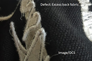 Excess back fabric in embroidery