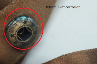 Defective trim attached in a garment